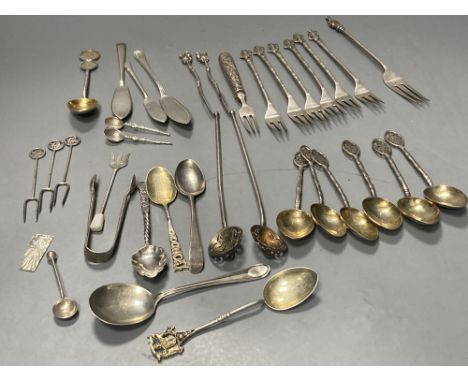 A group of assorted Chinese white metal spoons and forks, including set of six teaspoons and ten small items of English silve