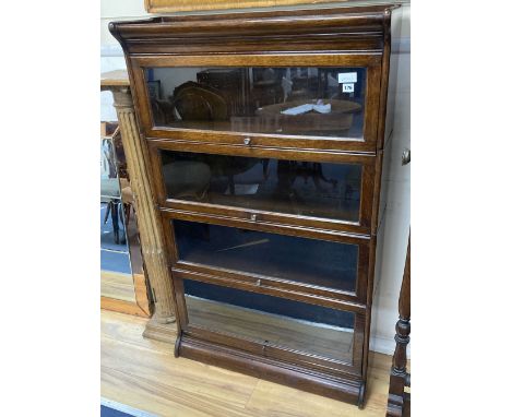 A Globe Wernicke style oak four section bookcase, width 88cm depth 30cm height 140cm