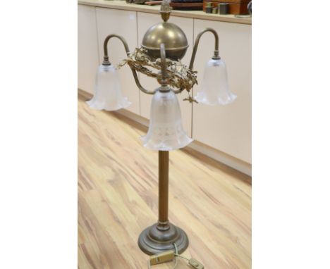 A gilt metal three branch lamp, height 92cm