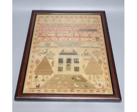 A framed George III sampler, dated 1818, 43 x 33cm, framedCONDITION: Small tear by top left side of the border and another si