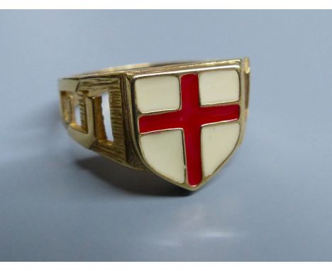 A modern 9ct gold and two colour enamel set 'Cross of St George' signet ring, size T, gross 5.1 grams.CONDITION: Overall cond