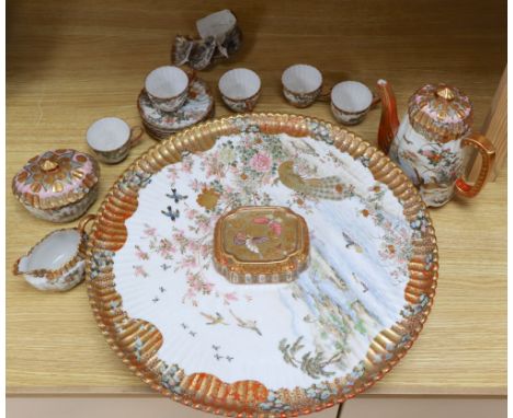 A Kutani part coffee service, with tazza tray base, largest diameter 45cmCONDITION: One cup and saucer are in pieces plus two