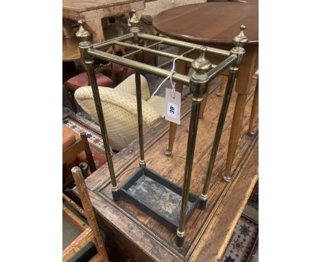 A Victorian brass and cast iron six division stick stand, width 32cm depth 19cm height 62cm