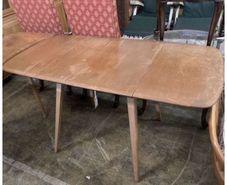 An Ercol elm drop-flap dining table, extended 130cm depth 74cm height 70cm