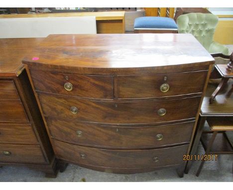 A George III mahogany bow fronted, five drawer dressing chest, raised on bracket feet, 42 h, 41 w