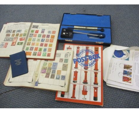A Planimeter together with cased British First Decimal coins and mixed stamps from around the world