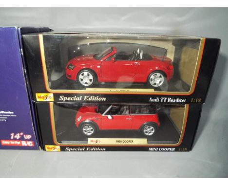 A quantity of diecast vehicles to include Maisto Special Edition Audi TT Roadster and Maisto Special Edition Mini Cooper both