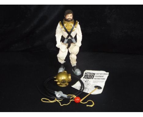 Palitoy - An unboxed Palitoy Vintage Action Man figure in Deep Sea Diver Uniform. The figure is a brown flock bearded version