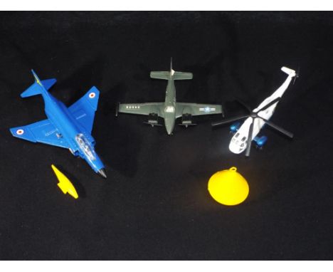 Dinky - Three unboxed Dinky Military Aircraft. Lot contains, Dinky No.724 Sea King Helicopter in white and blue - with its ye
