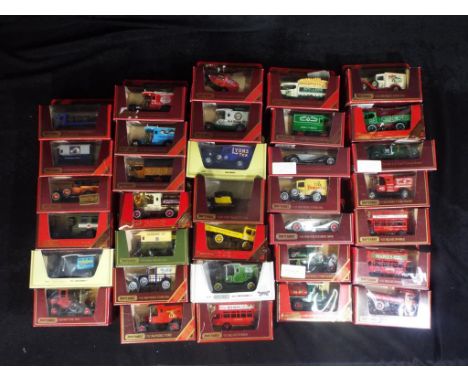 Matchbox - Approximately 33 boxed Matchbox Models of Yesteryear. Lot includes Y20 Mercedes Benz 540K; Y3 Ford Model T Tanker 