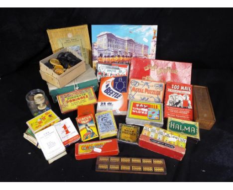 A selection of vintage games to include Chad Valley metal puzzles, Halma domino set, Wodr Making and Word Taking by Spears Ga