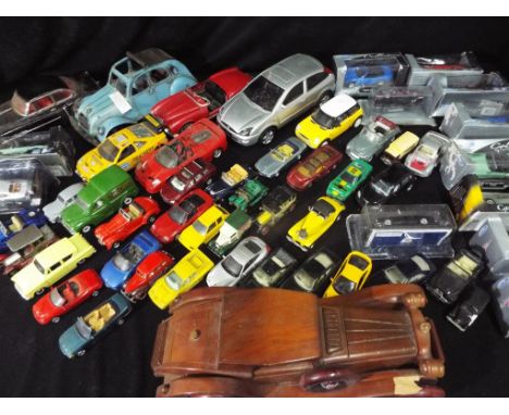Diecast models - a quantity of boxed and unboxed playworn vehicles by Welly, Burrago, Matchbox and others, also included in t