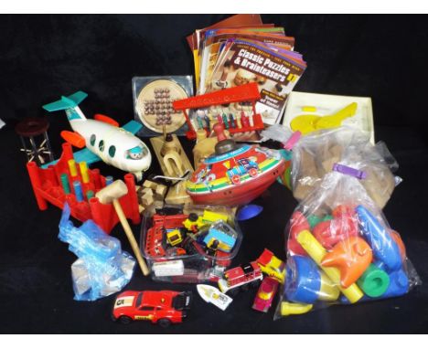 Chad Valley, Fisher Price and others - A collection of unboxed vintage toys and modern wooden puzzles, games and diecast. Lot