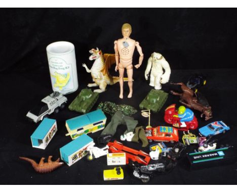 Palitoy and Others - An unboxed Palitoy Talking Action Man with a collection of unboxed vintage plastic toy cars and figures,
