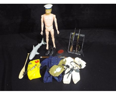 Palitoy - A unboxed Palitoy vintage Action Man figure (Nude). The figure is a blond flock hair and bearded hard hands version