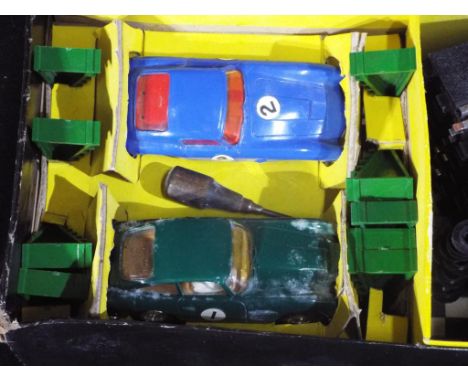 Scalextric - A boxed vintage Scalextric no.55 Racing Set. Set contains a quantity of track , hand controllers and two racing 