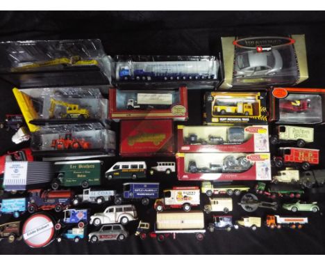 Atlas Editions, Matchbox, EFE, Bburago and others - 12 boxed diecast model vehicles together with a quantity of unboxed dieca