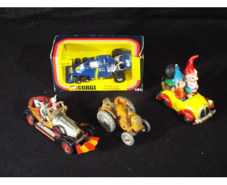 Dinky, Corgi - 4 diecast model vehicles. Lot includes Corgi 161 Elf Tyrell Project 34 which appears in Mint condition in a Go