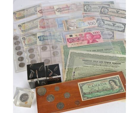 Canadian coins and banknotes to include three paperweights set with coins, plaque containing a Canadian&nbsp;one dollar note 
