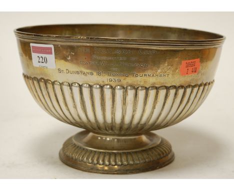 A late Victorian silver bowl of half fluted form with presentation inscription by William Hutton & Sons of Sheffield, 1900