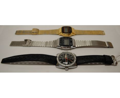 A Timex steel cased gents divers watch, having automatic movement, rubber strap, boxed; and two other Timex digital watches (