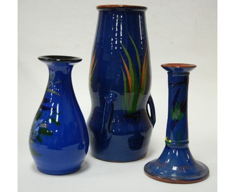 A large early 20th century Longpark pottery gourd shaped vase, on a blue ground with painted butterfly decoration, h.29cm; to