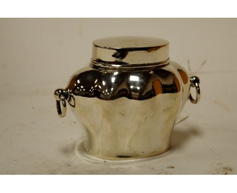 A mid 20th century silver tea caddy of squat melon form by Walker & Hall