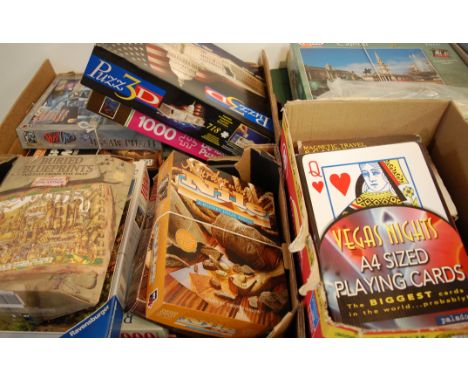 A large collection of assorted childrens toys and games to include; playing cards, jigsaw puzzles etc 