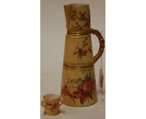 A circa 1900 Royal Worcester blush ivory ewer of tapered cylindrical form with hand painted floral decoration within gilt ban