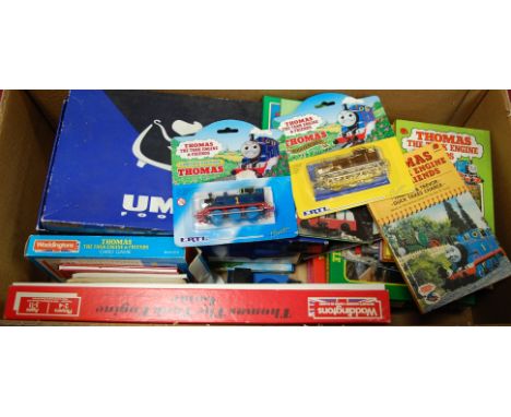 A box of assorted children's toys and games to include Waddingtons Thomas the Tank Engine game, various puzzles etc