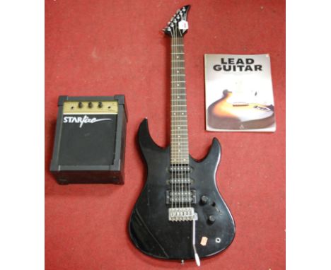 A Yamaha RGX112 electric guitar, together with an amplifier and guitar manual