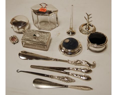 An early 20th century silver mounted pin cushion; together with a silver mounted shoe-horn, button hooks, ring tree etc  Cond