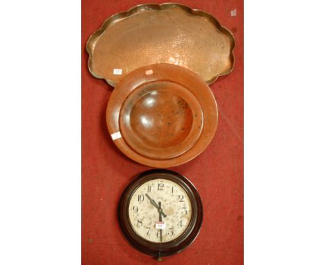 An mid-20th century Smith's bakelite cased wall clock; together with an Art Nouveau brass tray; and two shallow bowls (4)