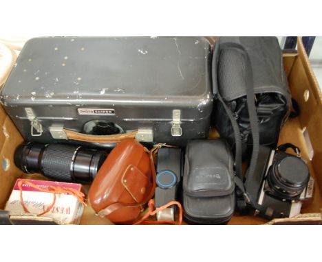 A collection of assorted cameras and equipment to include Russian photo sniper lens cased, Minolta X300 camera etc