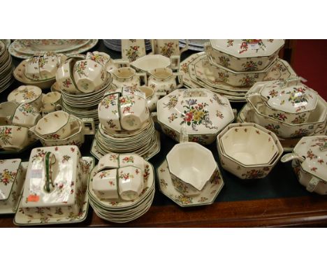 An extensive Royal Doulton tea and dinner service in the Old Leeds Sprays pattern to include; meat plates, tureens and covers