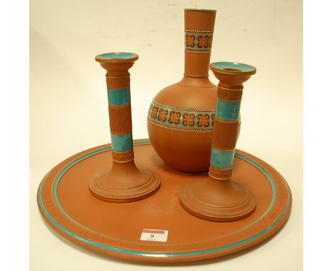 A Watcombe pottery terracotta charger, printed Watcombe Torquay mark verso, dia.38cm; together with a Watcombe terracotta bot