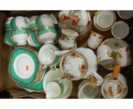 A Royal Albert Old Country Roses pattern part tea service; together with a Foley china part tea service; and one other Gladst