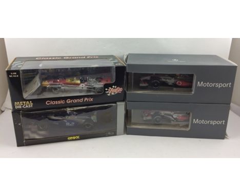 FOUR VARIOUS DIE-CAST F1 RACING CAR MODELS including Onyx Williams Renault Canadian driver German GP 1997, Quattro cast model