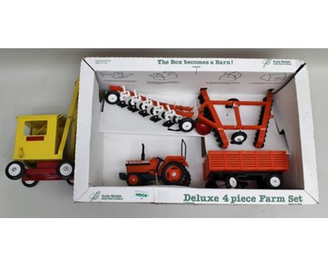 A SUTCLIFFE TIN-PLATE 4-WHEEL MOBILE CRANE and a DELUXE FOUR PIECE FARM SET scale model containing Kubota L2850 tractor, trai