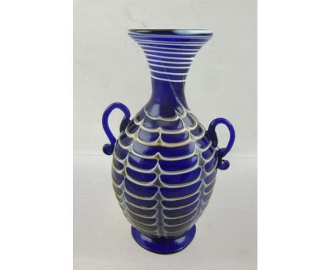 A LATE 19TH CENTURY MURANO COBALT BLUE GLASS VASE of urn form with applied handles, Fenicio trailed decoration, probably C'ia