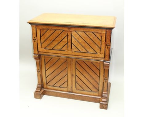 A LATE 19TH CENTURY AESTHETIC DESIGN LIGHT OAK FALL-FRONT WRITING BUREAU, with ebonised detail and decoration, the fall opens
