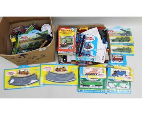 A QUANTITY OF ERTL THOMAS THE TANK ENGINE AND FRIEND'S SERIES, locomotives, carriages, track many in original packaging toget