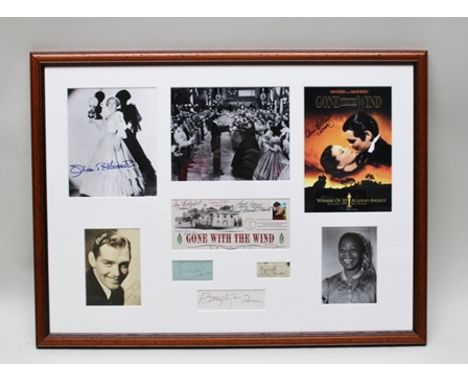 AN AUTOGRAPH MONTAGE FOR "GONE WITH THE WIND" (Released 1940) comprising; a signed first day cover stamped envelope with 1990