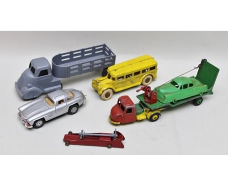 A CRESCENT TOYS DIE-CAST SCAMMELL SCARAB RECOVERY VEHICLE, together with winch and ramp, a tinplate trolley jack, a Mercedes 