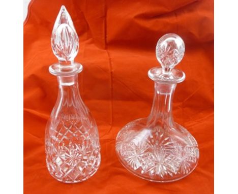 A CUT LEAD CRYSTAL SHIP'S DECANTER with stopper, and a DECANTER with steeple stopper (2) 