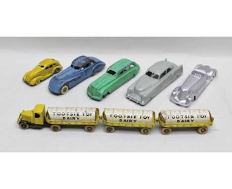 TOOTSIE TOYS OF AMERICA die-cast American sedans, a two seater open tourer, two seater coupe together with a tin-plate yellow