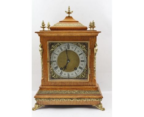 A GEORGIAN DESIGN OAK CASED AND GILT METAL MOUNTED BRACKET CLOCK, signed 'Lenzkirch', movement no.181904, 42cm high 