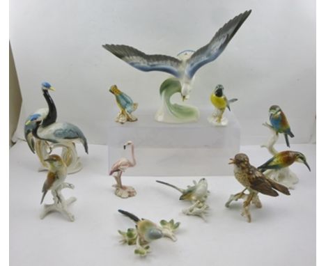A COLLECTION OF KARL ENS RUDOLSTADT VOLKSTEDT CERAMIC BIRD FIGURINES, includes a pair of Emus, 26cm high, also an AUSTRIAN WI
