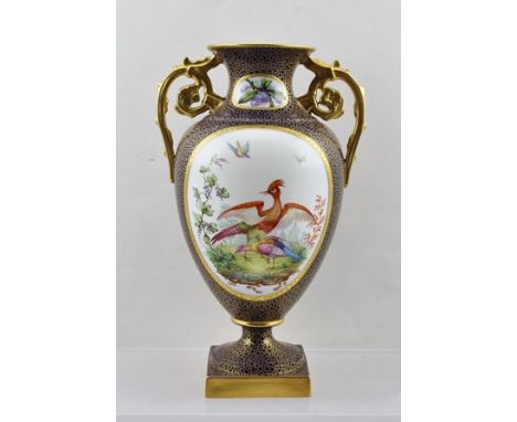 A COPELAND SPODE PORCELAIN VASE, of urn form with gilded handles, cobalt blue ground gilded mesh, painted with a panel in col