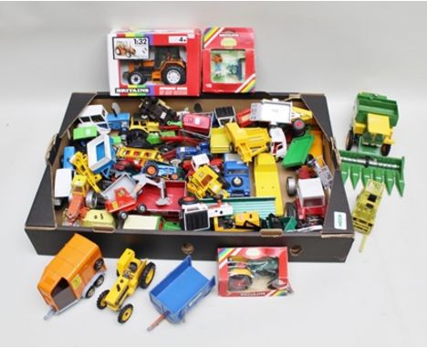 A COLLECTION OF ASSORTED DIE-CAST AND PLASTIC AGRICULTURAL VEHICLES by Britain's, Corgi, Dinky, etc including numerous tracto